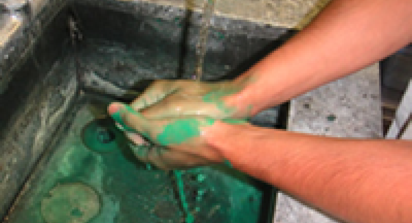 image of a person washing their hands