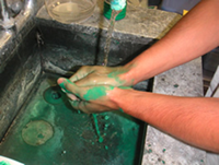 image of a person washing their hands